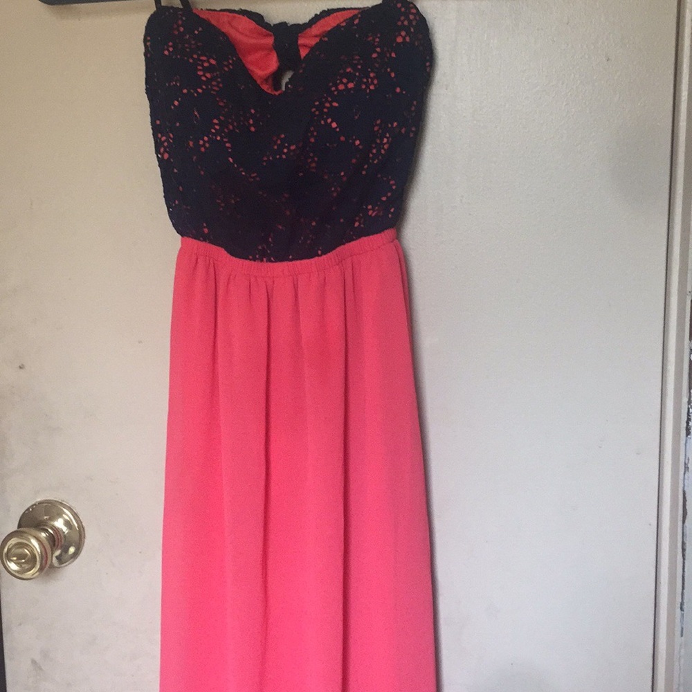 A long coral and navy blue dress.